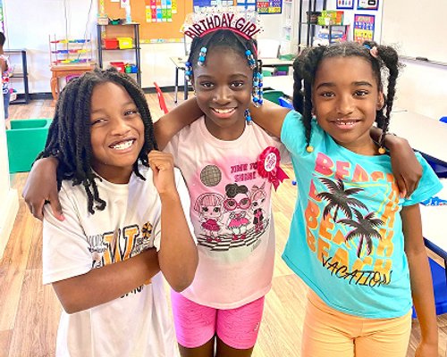 Happy kids at Red Trolleys Daycare in Valdosta, GA attending preschool program.
